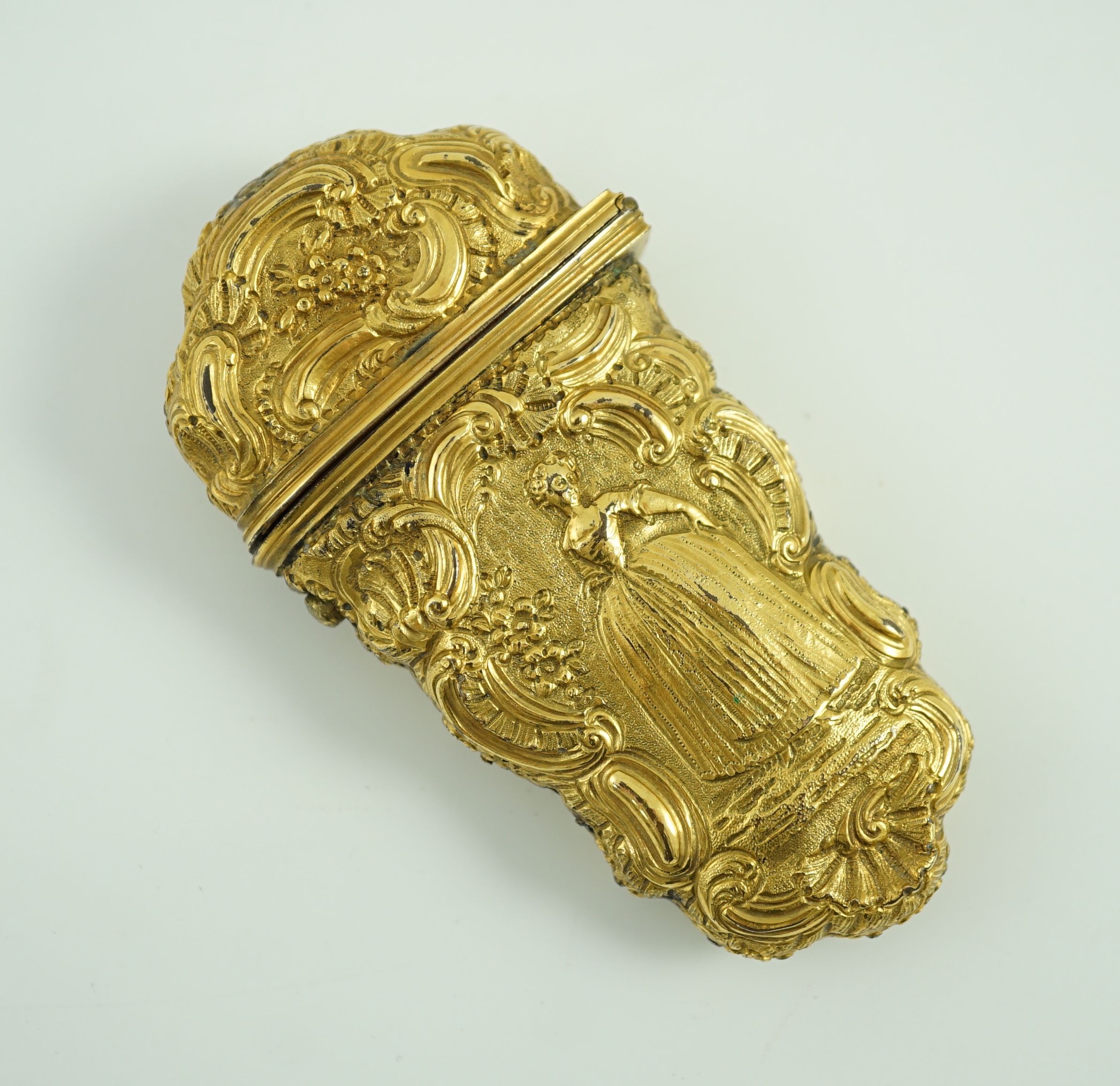 A George III gilt metal etui containing accessories, 10cms high.